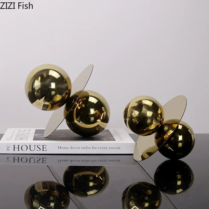 Gold decorative spheres on a reflective surface with &