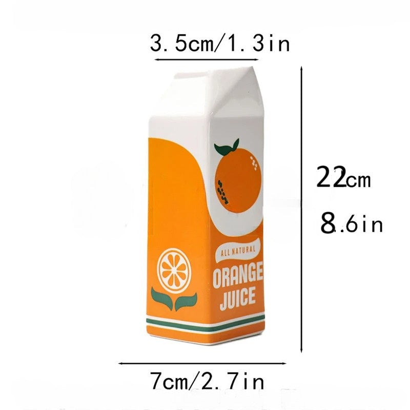 Measurement chart of an orange juice box with dimensions labeled.