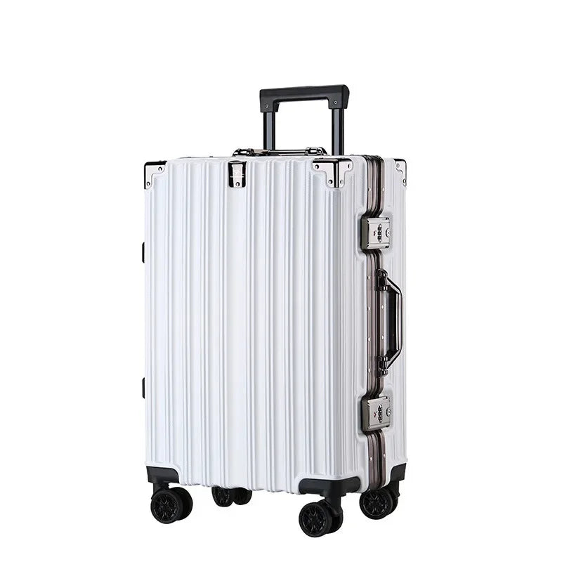 Side view of sleek silver luggage with TSA-approved lock and aluminum accents.