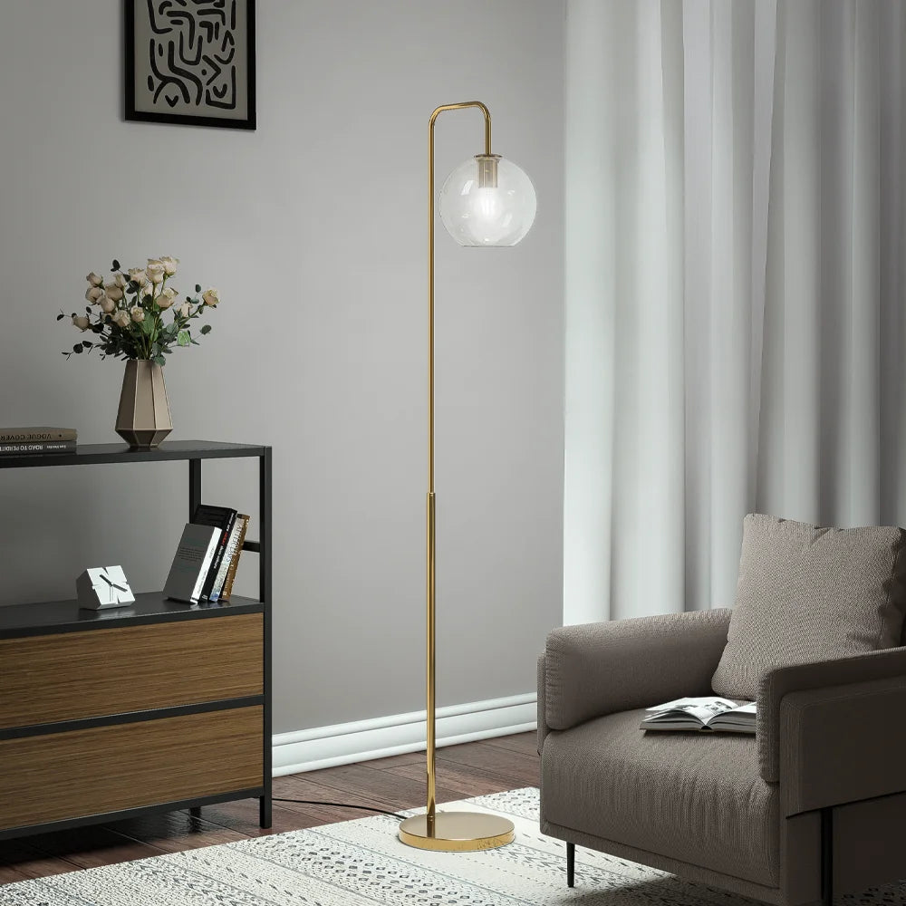 Modern living room with a floor lamp, sofa, and side table.
