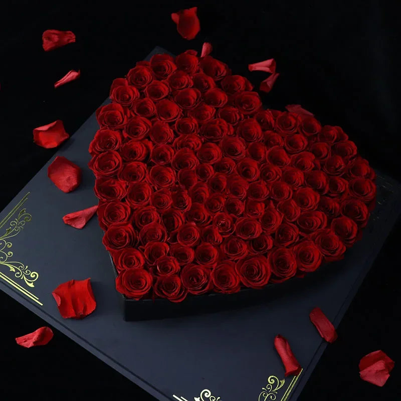 Close-up of preserved red roses in a wicker vase.