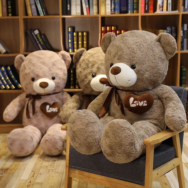 Giant stuffed bear sitting upright.