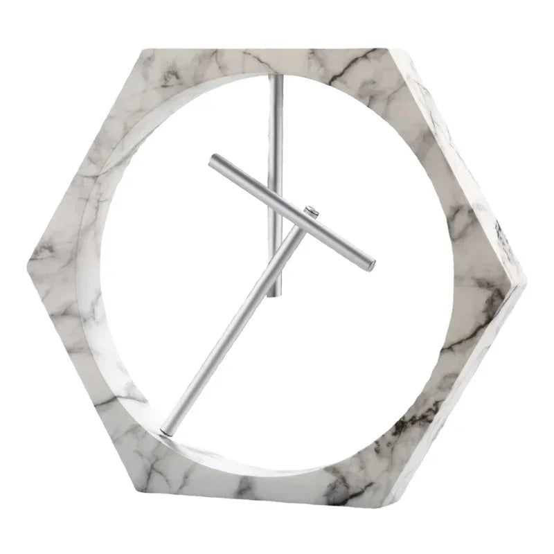 Hexagonal marble clock with silver hands on a white background