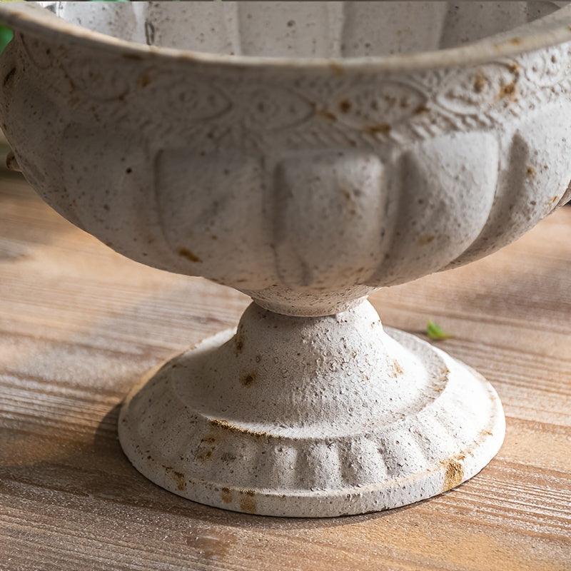 Romantic trophy-shaped flower vase for rustic home styling.