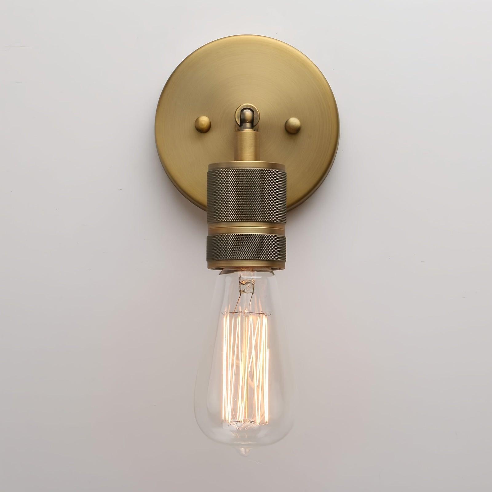 Vintage-inspired up/down wall sconce for dining room ambiance.