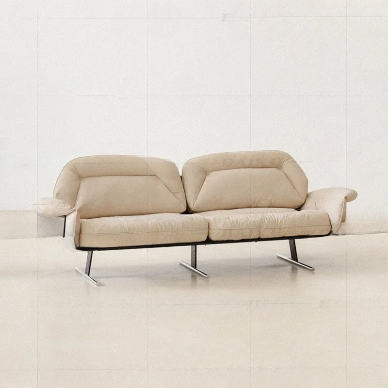 Beige sofa with metal legs on a white background