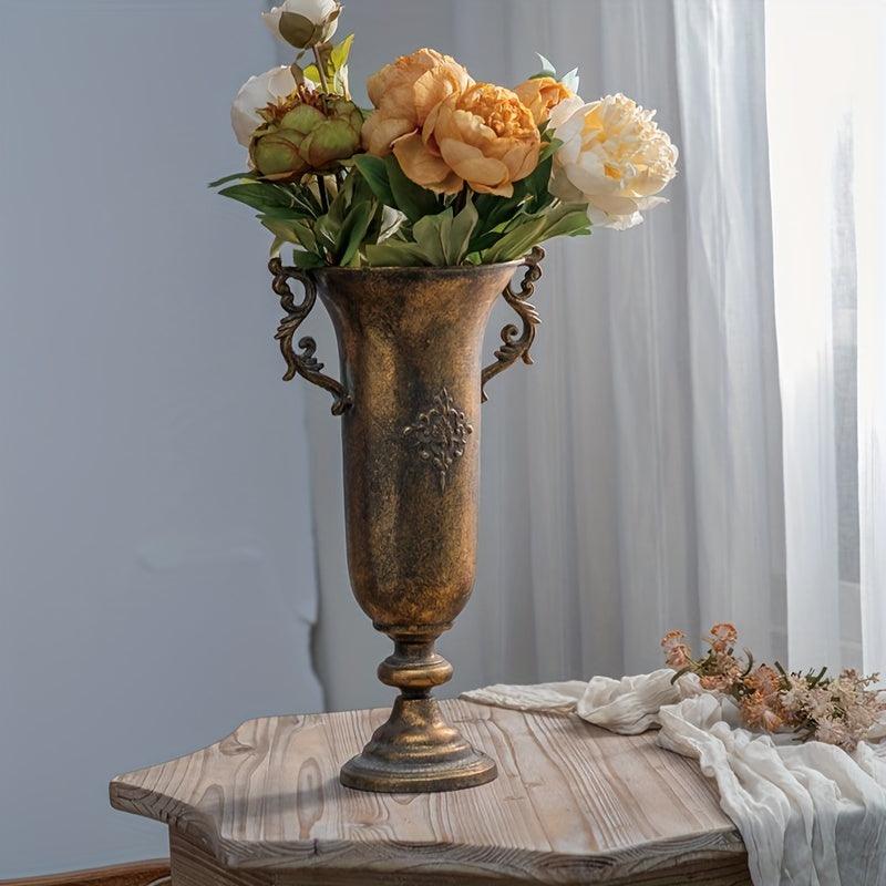 Antique metal bud vase for farmhouse-style table settings.