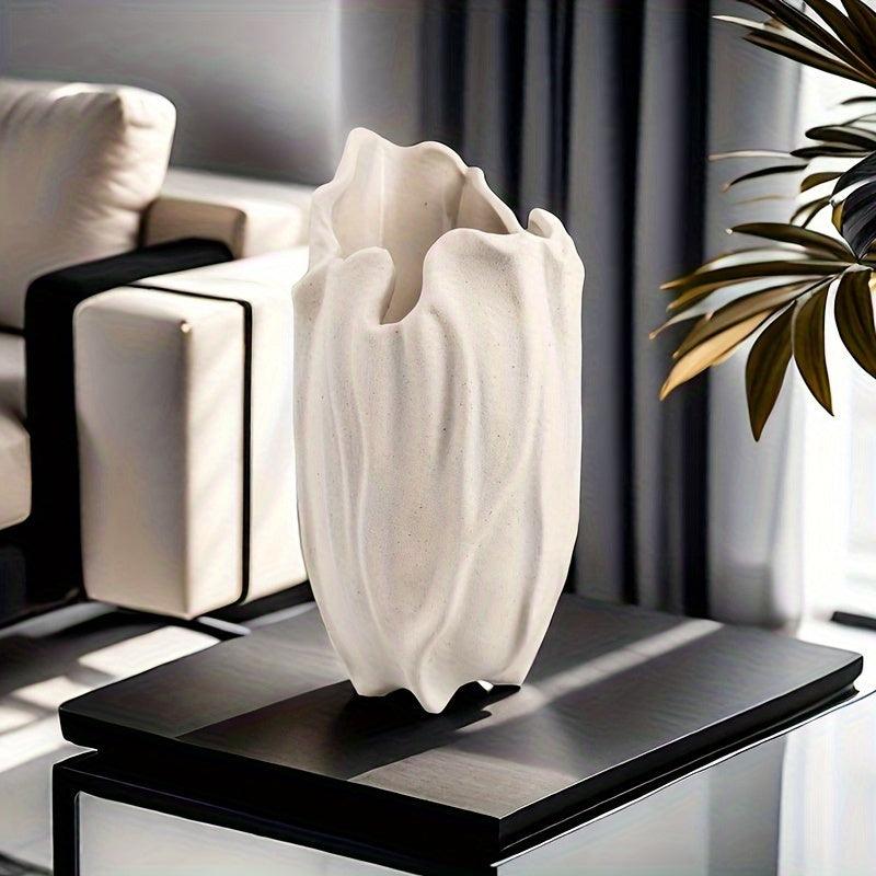 Durable ceramic vase for fresh flowers or decorative use.