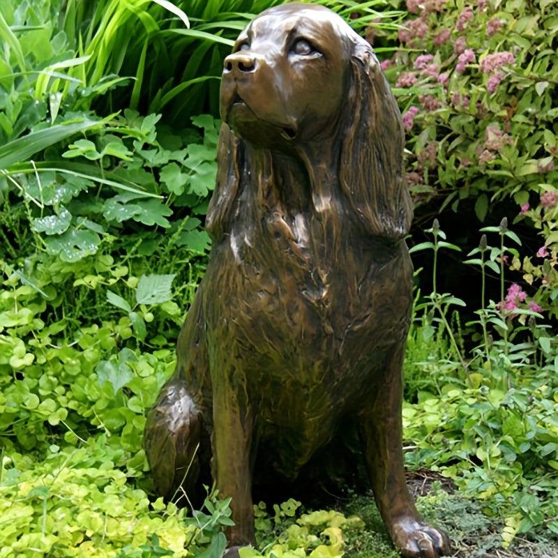 Cocker Spaniel sitting cold cast bronze statue for home decor.