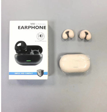 White wireless earbuds with packaging on a gray background