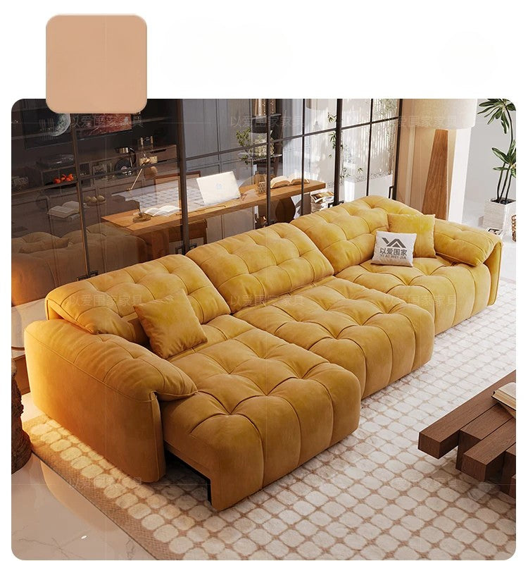 Yellow tufted sofa in a modern living room setting