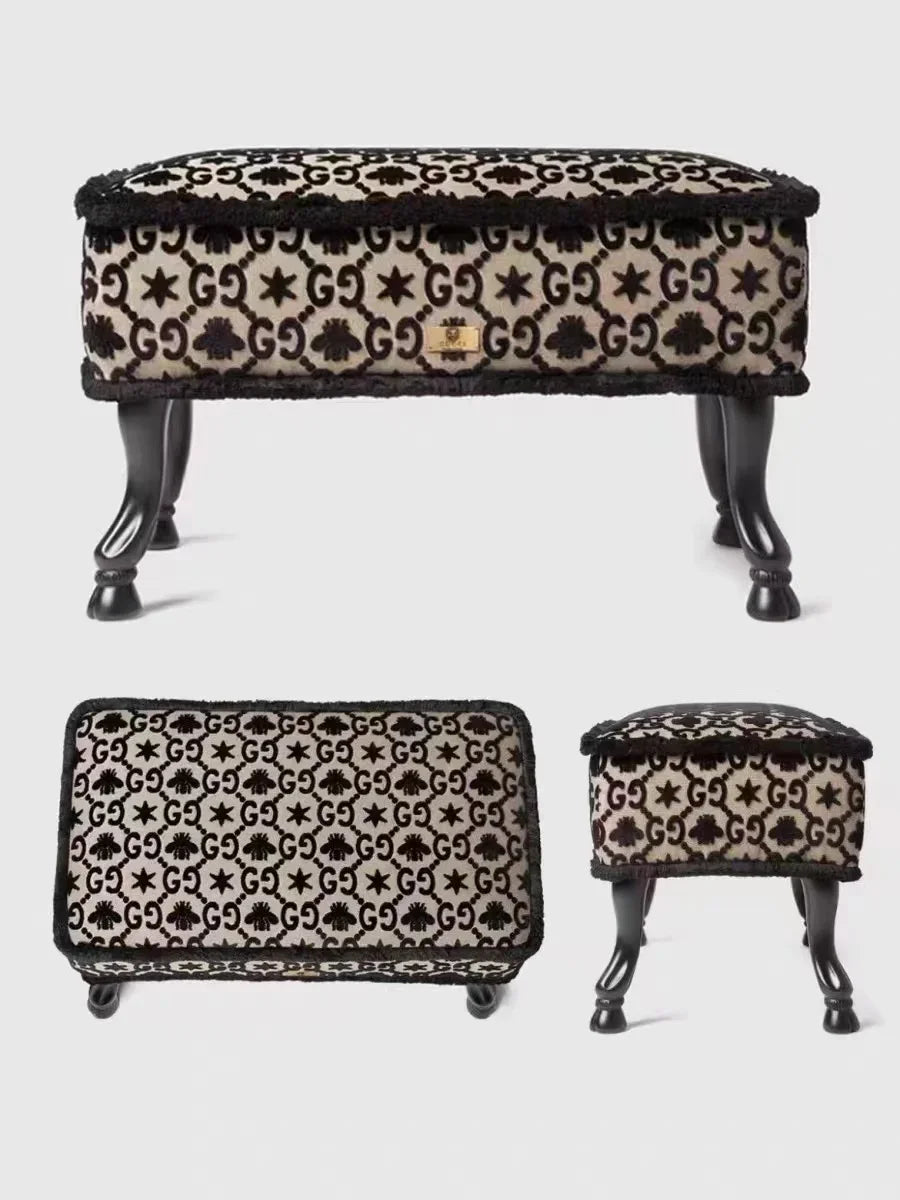 Set of three patterned stools on a white background