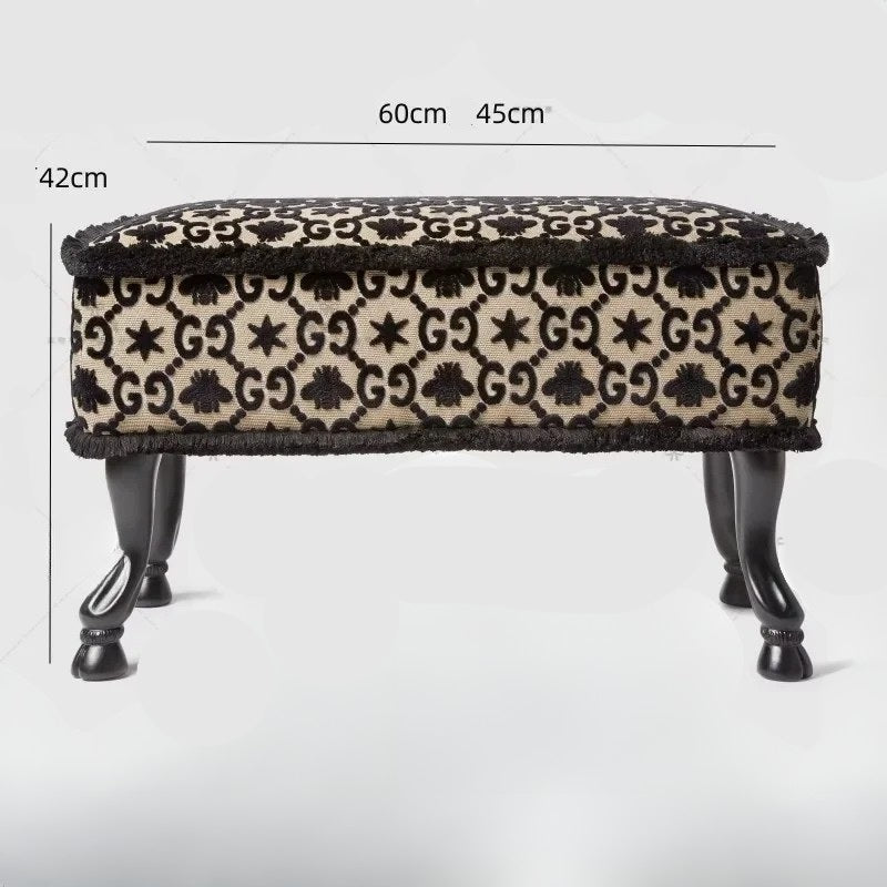 Patterned ottoman with dimensions on a white background