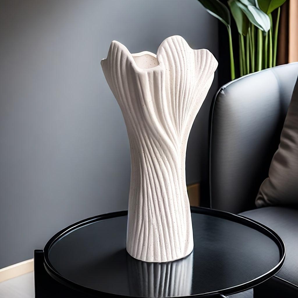 Contemporary striped vase for fresh flowers and minimalist decor.