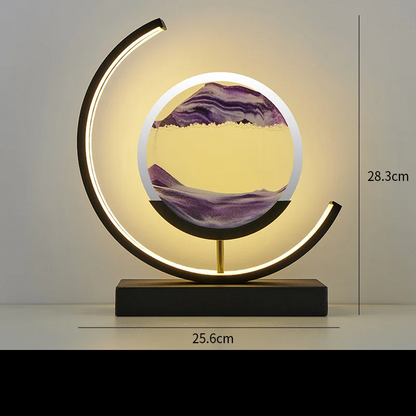 Adjustable brightness sand art desk lamp in minimalist home office setup.