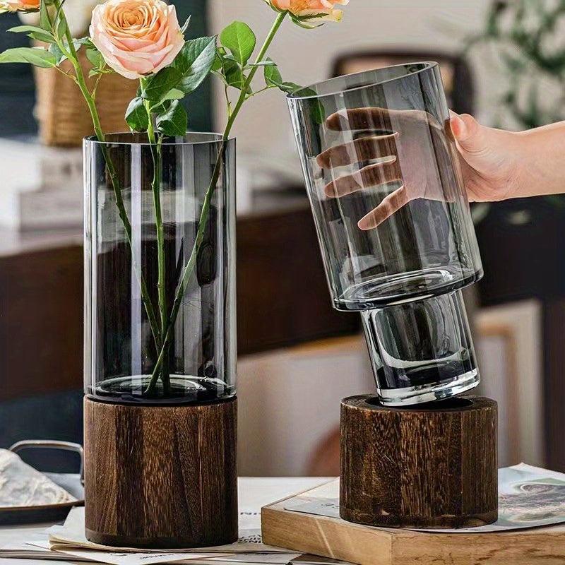 Nordic-inspired glass vase with a natural wooden base for modern decor.