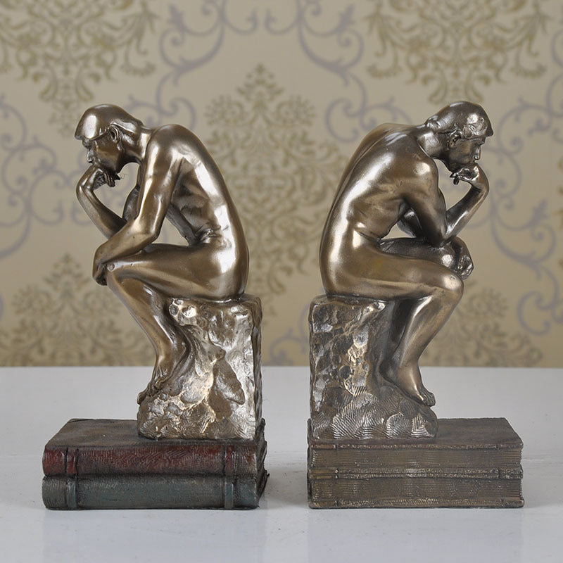 Introducing our high-end Thinker Ornaments Bookends, a creative and sophisticated addition to elevate your bookshelf or display space. - In home decor