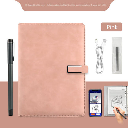 Pink planner with pen, charging cable, and smartphone app on a pink background