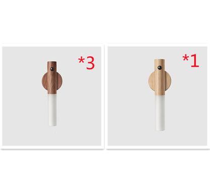 Two wooden and white cylindrical objects with quantity indicators on a white background