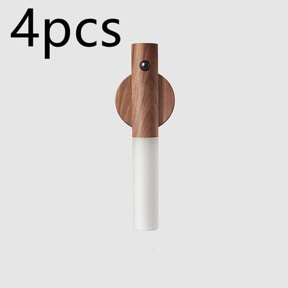 Wooden and white wall hook on a light gray background with &