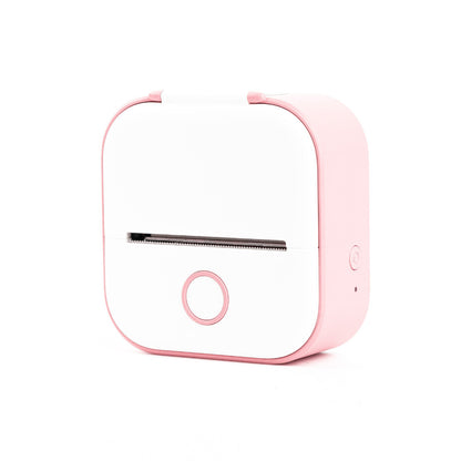 Pink electronic device with a white background
