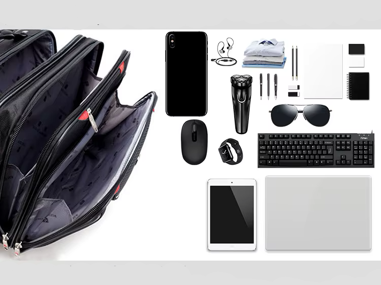 Collection of travel items including a suitcase, electronic devices, and office supplies on a white background.