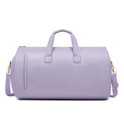 Lavender duffel bag with gold accents on a white background