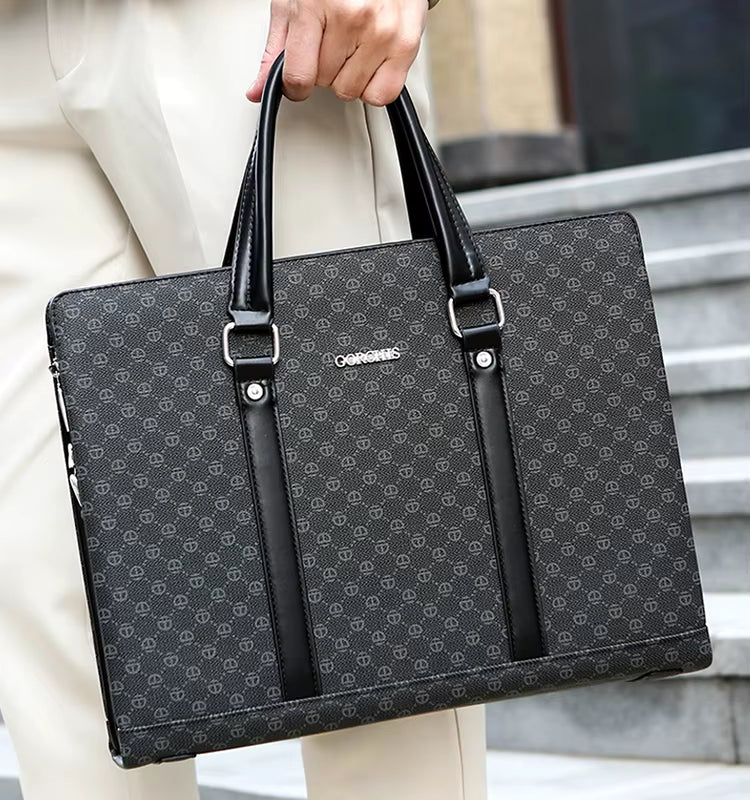 Person holding a black patterned briefcase with visible brand name.