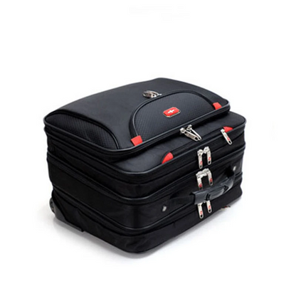 Stack of black suitcases with red accents on a white background