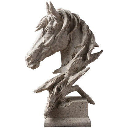 Stone sculpture of a horse head with flowing mane on a white background