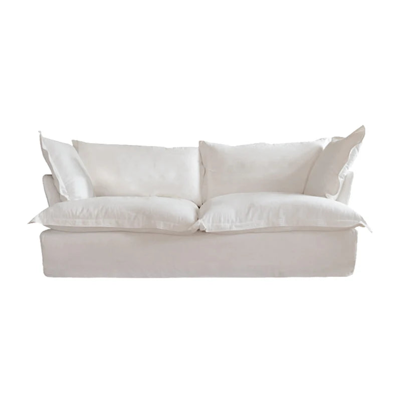 Beige sofa with white cushions on a white background