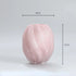 Pink glass vase with dimensions on a light gray background