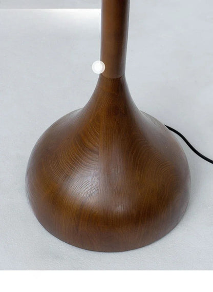 Wooden floor lamp on a white background