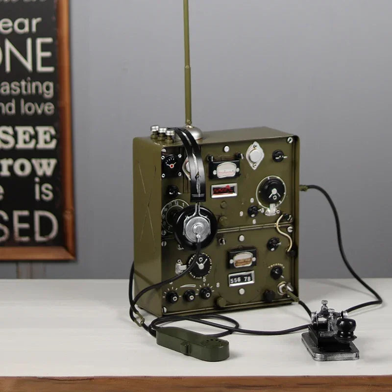 Vintage-style telegraph machine displayed on a desk or shelf.