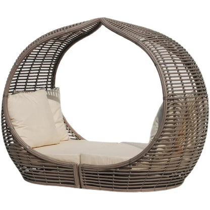 Sturdy frame of a durable outdoor rattan sun lounger.