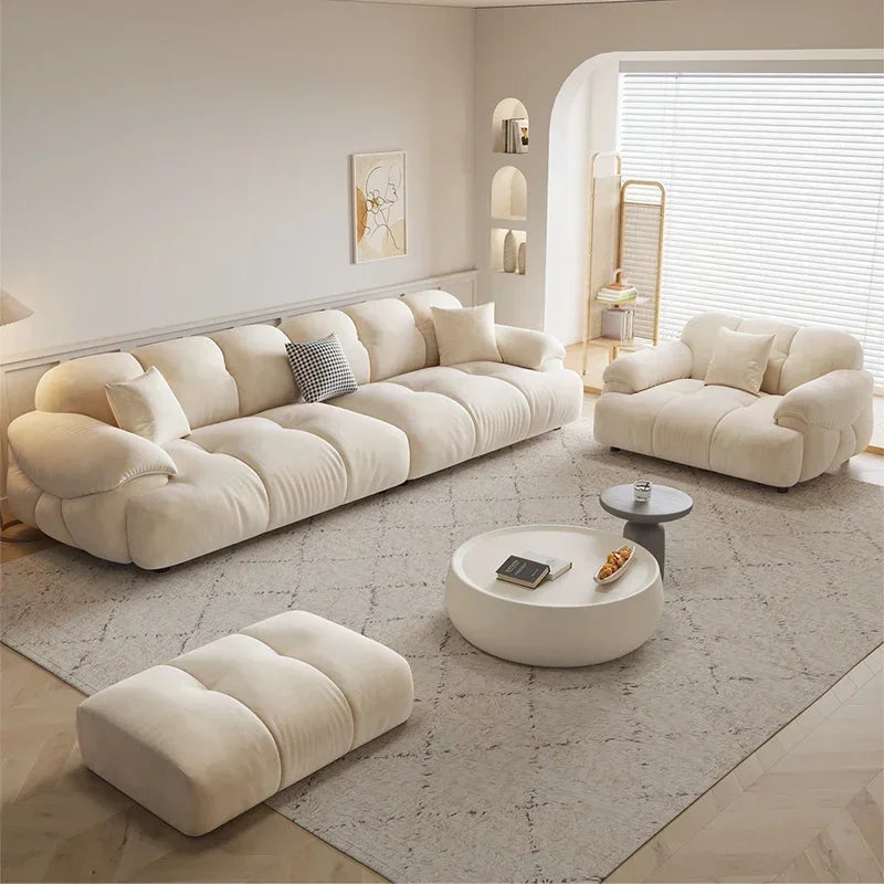 Contemporary recliner sofa bed with matching armchair and pouf