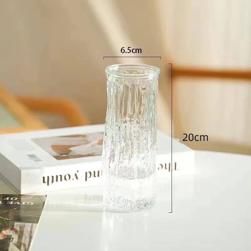 Clear glass vase with dimensions on a blurred background