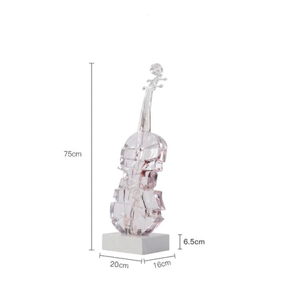 Modern art sculpture: a large champagne gold violin