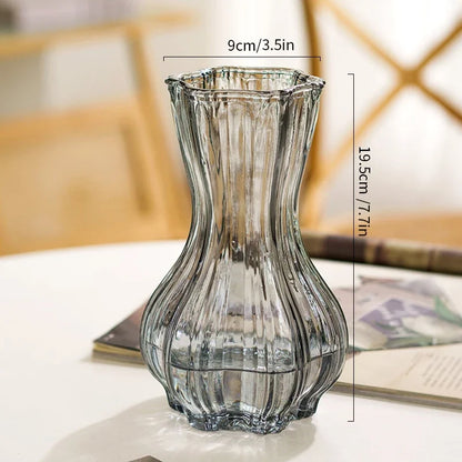 Clear glass vase with dimensions on a blurred background