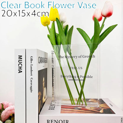 Clear book flower vase with tulips on a white background