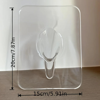 Clear adhesive hook with dimensions labeled on a white background