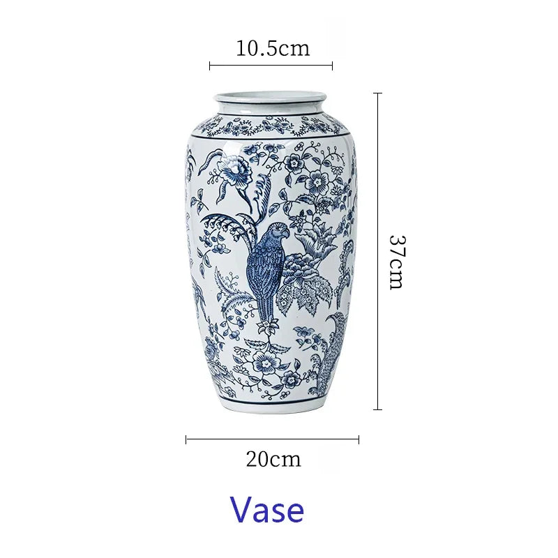 Ceramic vase with blue floral and parrot pattern, shown with measurements on a white background.