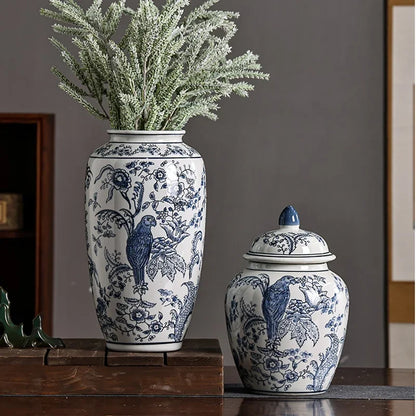 Two decorative vases with blue and white patterns on a wooden surface.