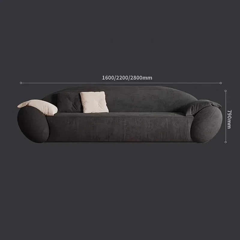 Gray sofa with dimensions indicated on a dark background