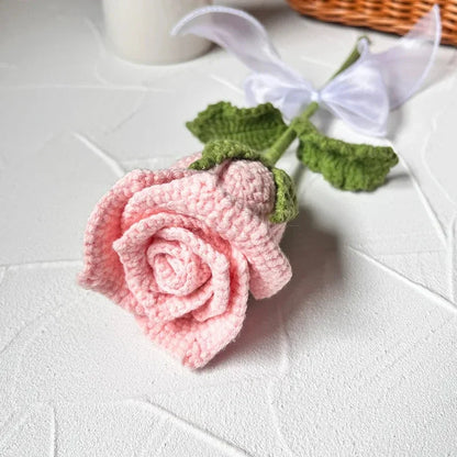 Handmade crochet rose flowers, detailed petal work.