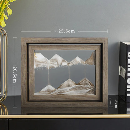 Framed mountain art piece on a shelf with dimensions indicated