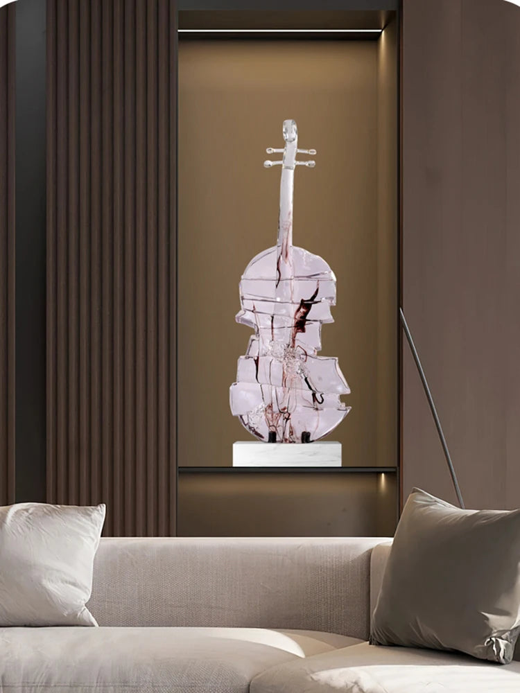 The violin statue displayed on a floor or against a wall.