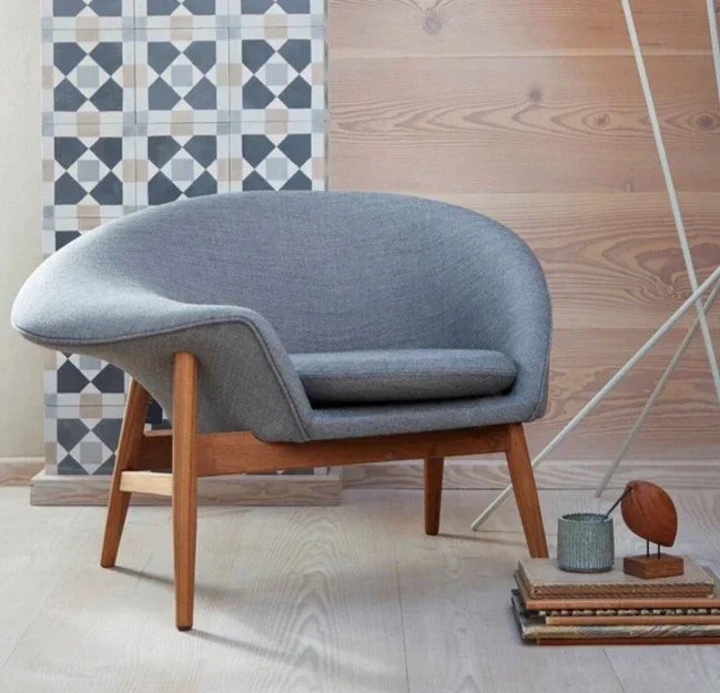 Side profile of Hans Olsen asymmetrical chair