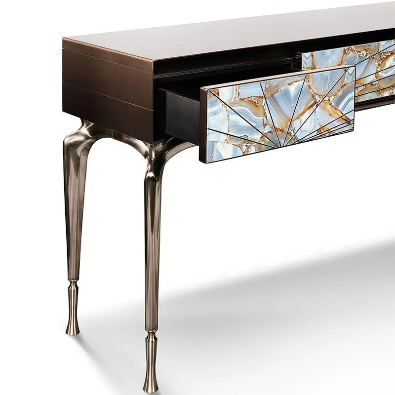 Decorative console table with marble-patterned drawer on a white background