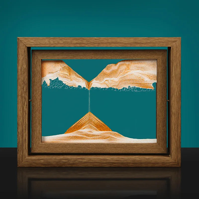 Framed artwork of a mountain landscape with a wooden frame on a teal background